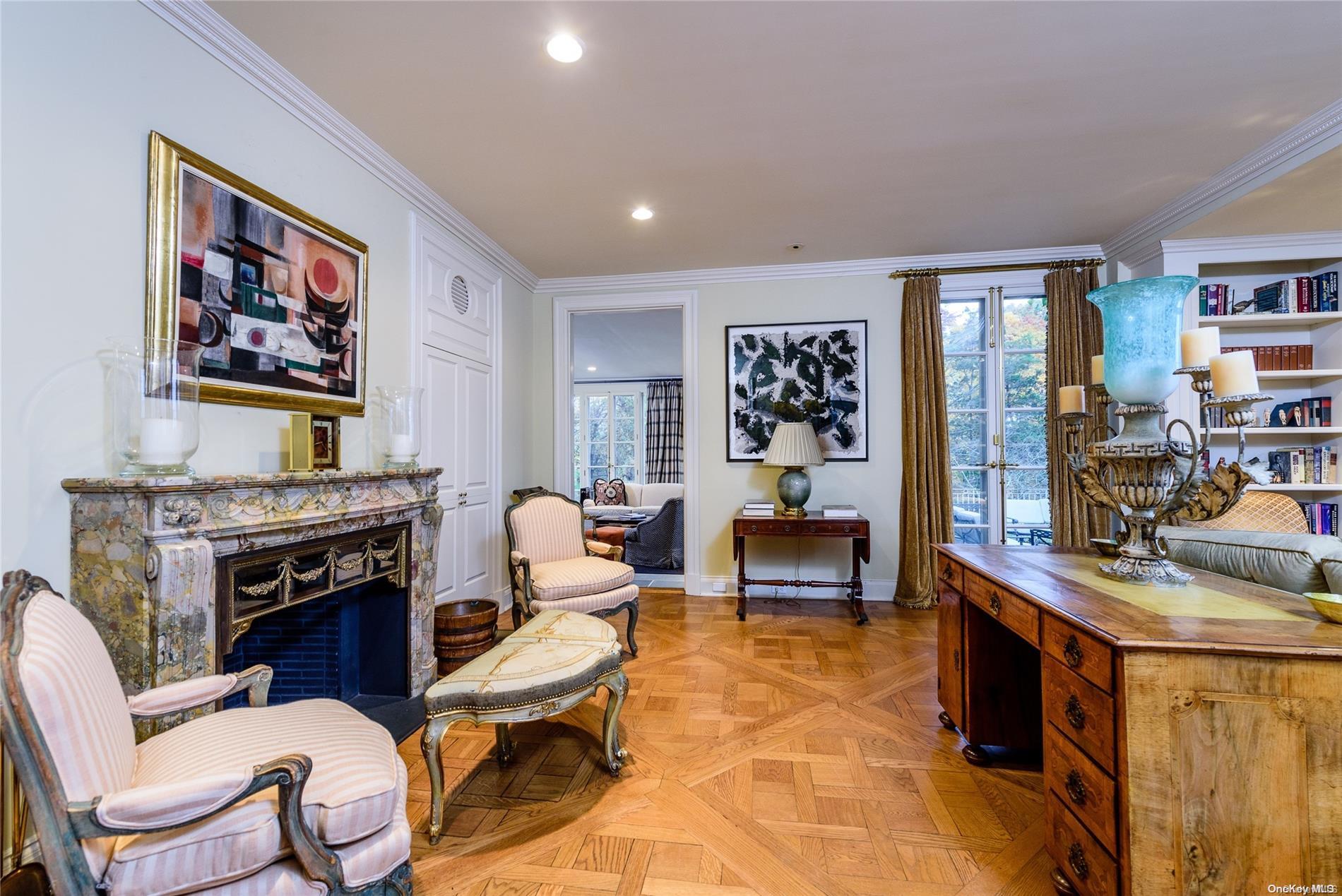 214 Cleft Road Mill Neck, NY 11765 - Photo 18 of 36 a living room with furniture and a flat screen tv