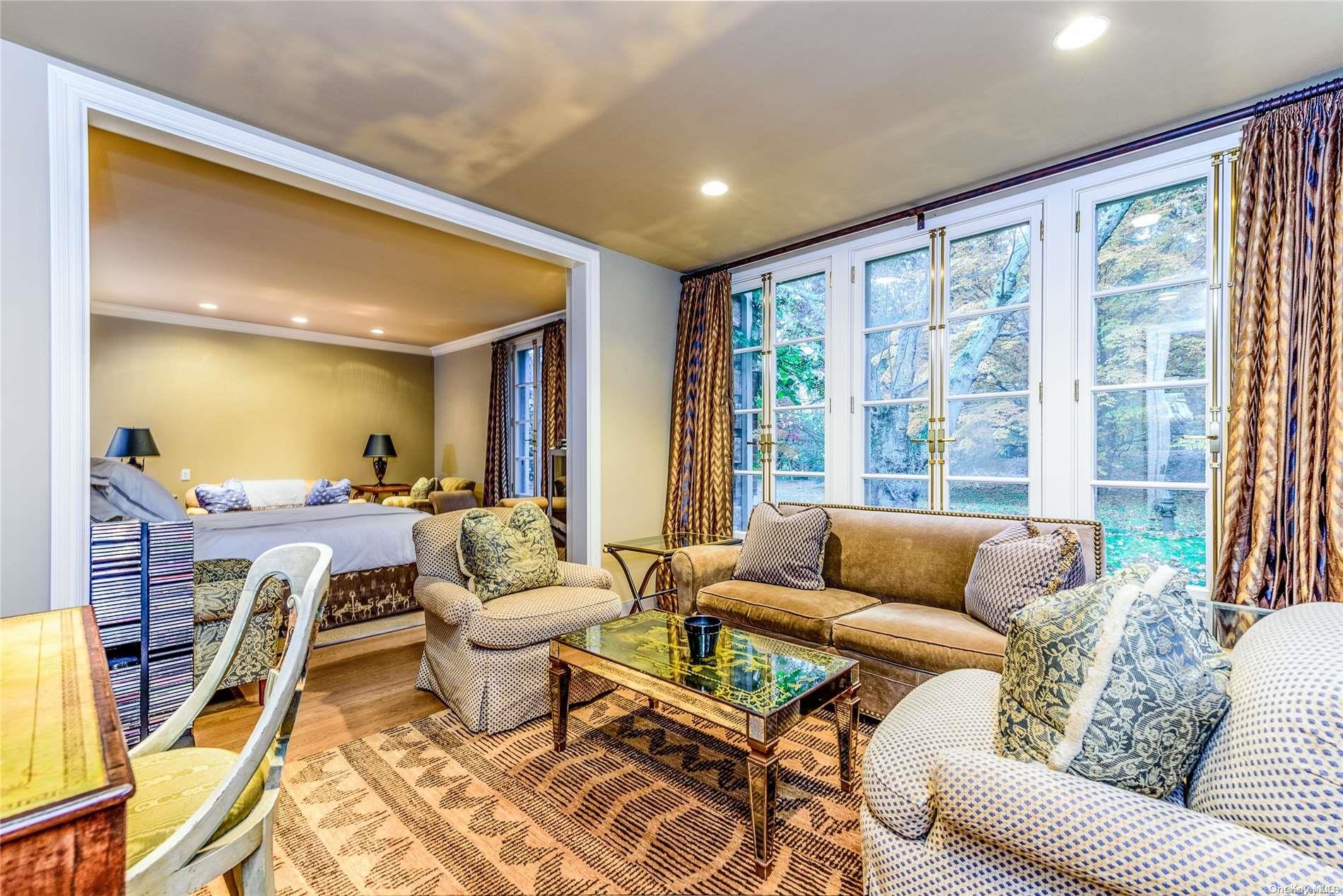 214 Cleft Road Mill Neck, NY 11765 - Photo 20 of 36 a living room with furniture and a large window