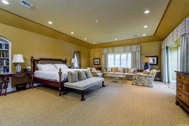 a bedroom with furniture and a couch