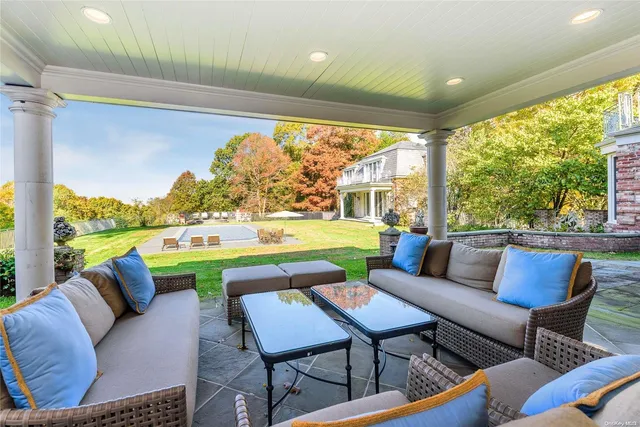 a outdoor living space with furniture and garden view
