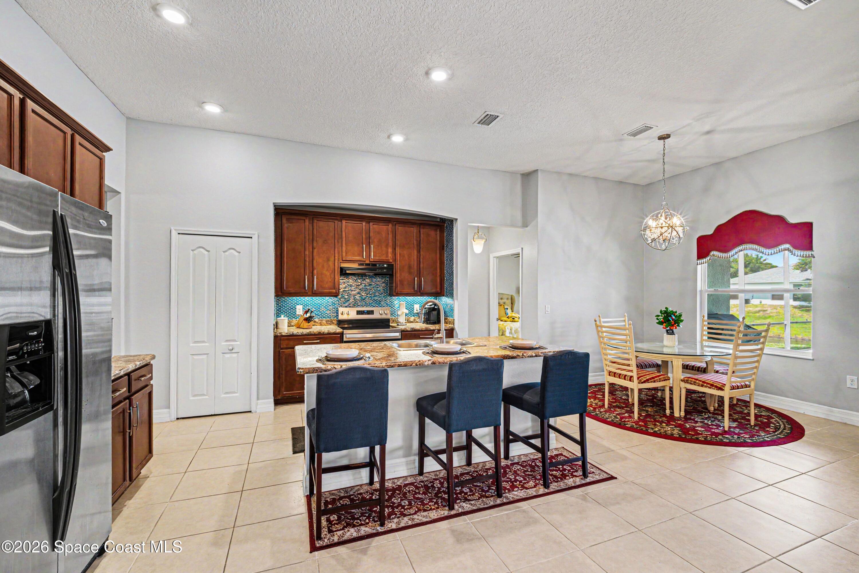 1025 Morgan Circle Northeast Palm Bay, FL 32905 - Photo 12 of 43 010_file_2909