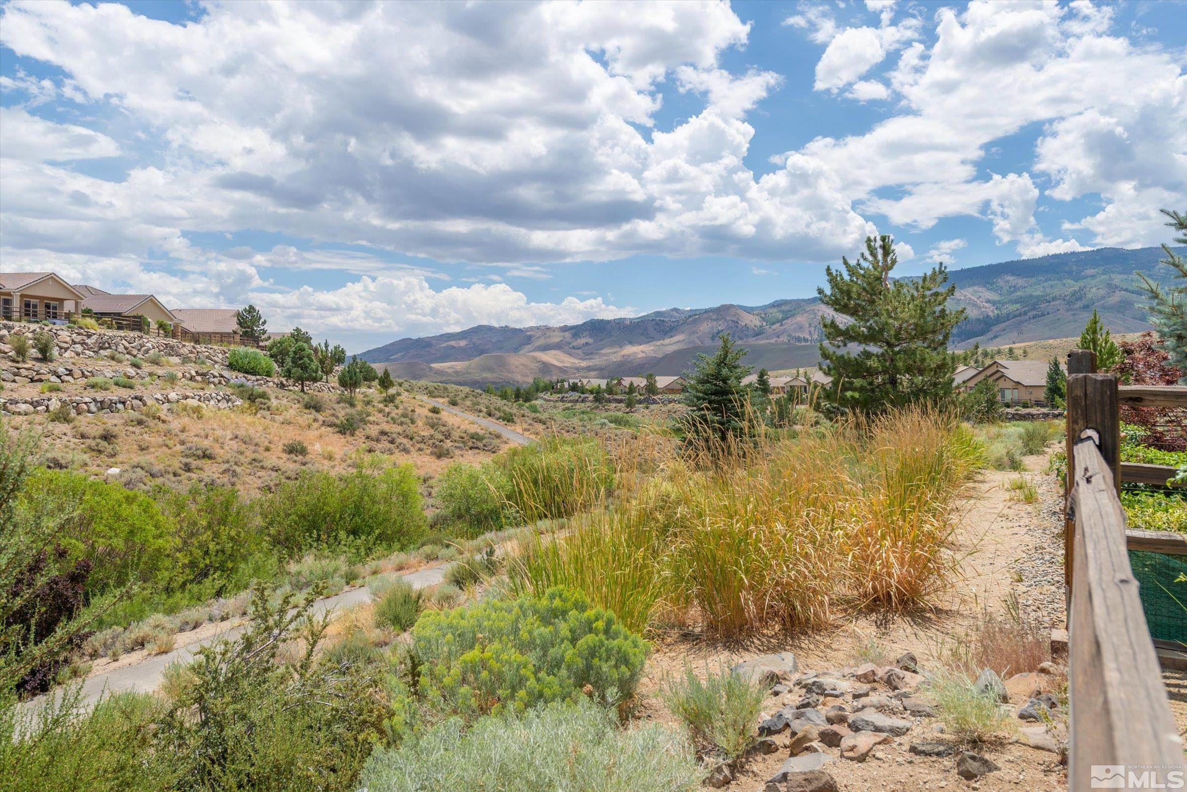 1310 Winterchase Way Reno, NV 89523 - Photo 3 of 38 a view of lake with green space