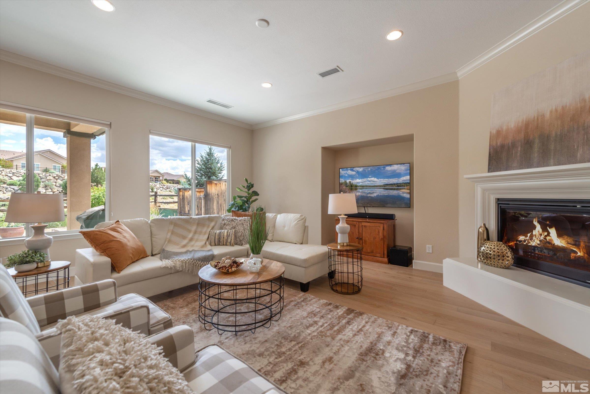 1310 Winterchase Way Reno, NV 89523 - Photo 8 of 38 a living room with furniture and a fireplace