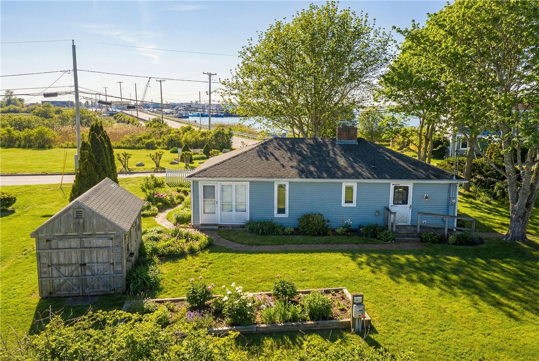 7 Conch Road Narragansett, RI 02882 - Photo 29 of 41 Landscaping has been virtually staged, including plantings and walkway.