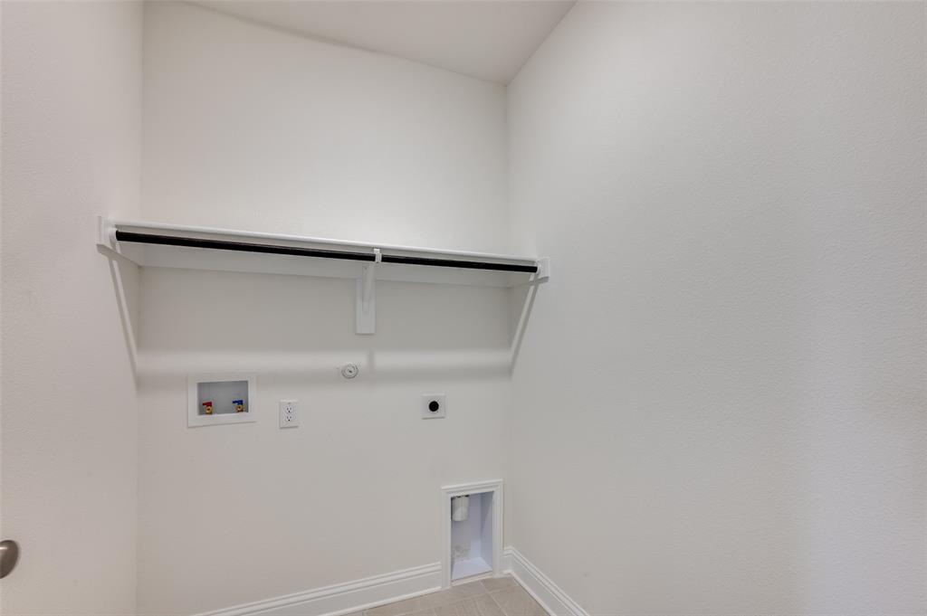 345 Fallbrook Drive Aledo, TX 76008 - Photo 21 of 32 Laundry area featuring gas dryer hookup, electric dryer hookup, and hookup for a washing machine