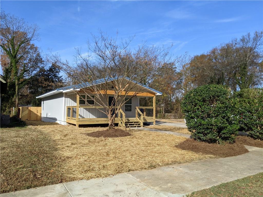 400 Pennington Avenue Southwest Rome, GA 30161 - Photo 1 of 1 a house with trees in front of it