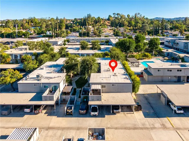 a view of multiple houses with a outdoor space
