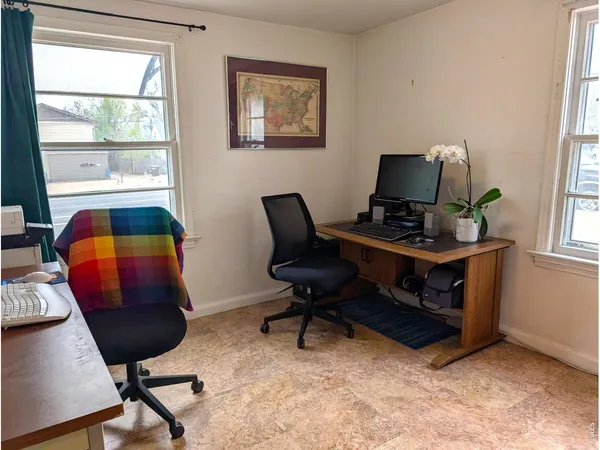 a room with furniture and window