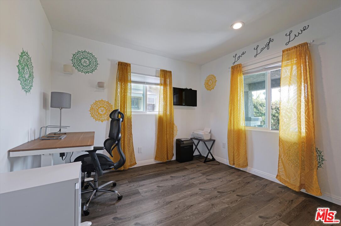 3447 9th Avenue Los Angeles, CA 90018 - Photo 11 of 18 a view of a room with gym equipment