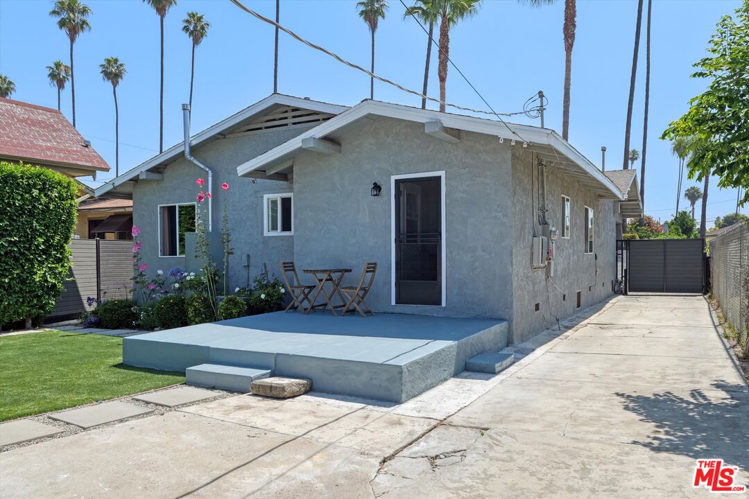 3447 9th Avenue Los Angeles, CA 90018 - Photo 15 of 18 a front view of house along with yard and green space
