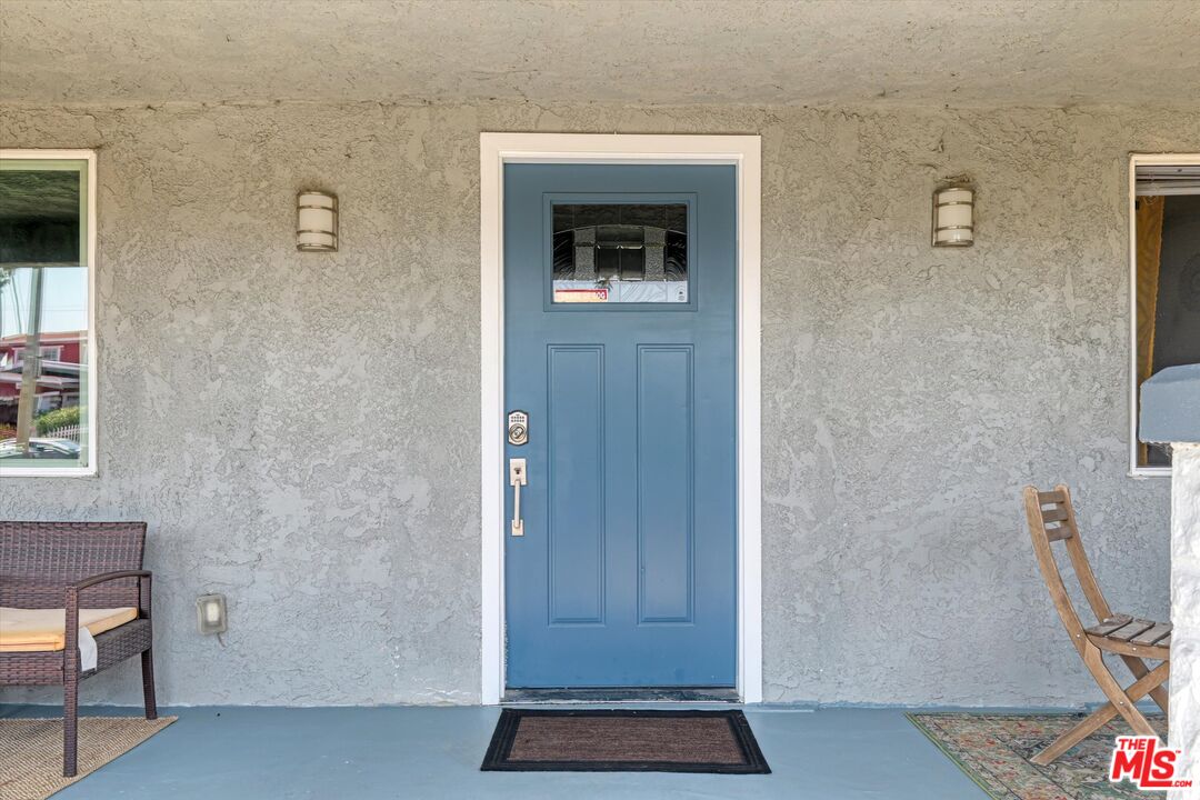 3447 9th Avenue Los Angeles, CA 90018 - Photo 3 of 18 a view of front door with wooden floor
