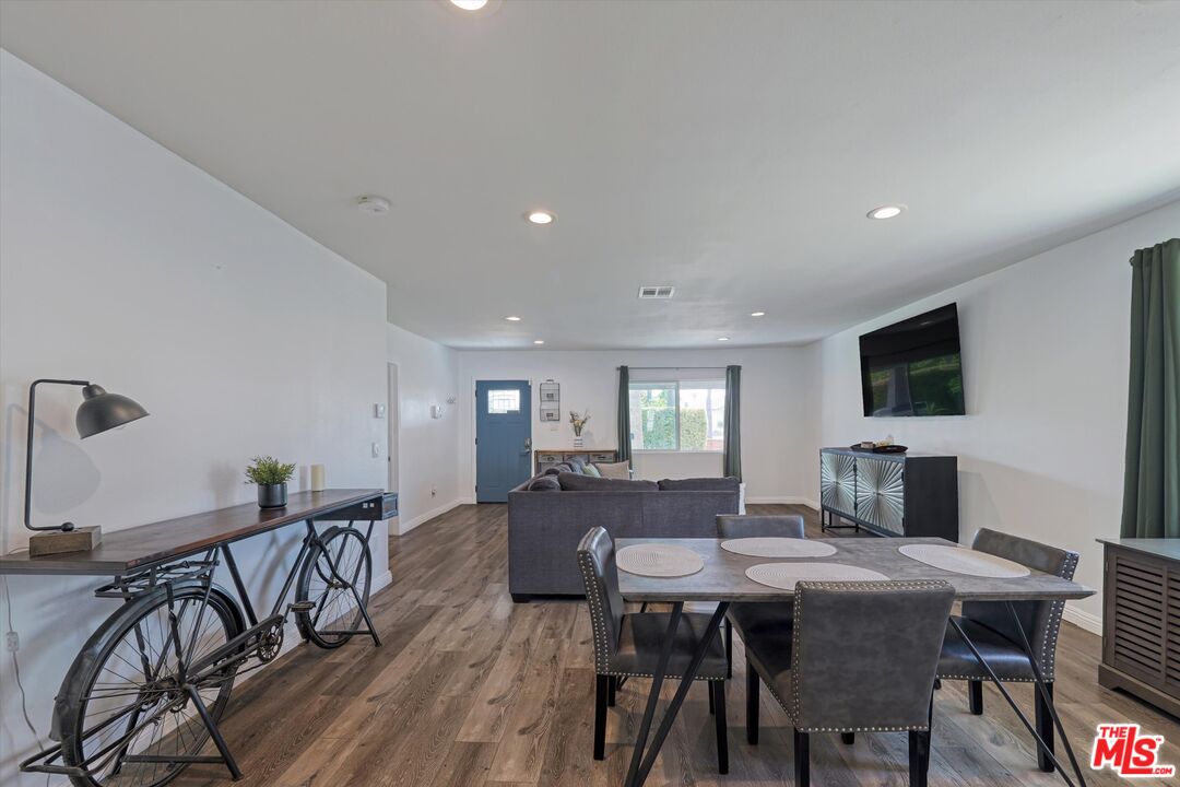 3447 9th Avenue Los Angeles, CA 90018 - Photo 5 of 18 a view of a dining room with furniture
