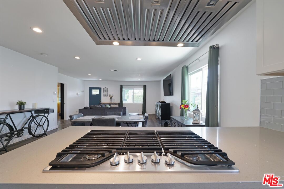 3447 9th Avenue Los Angeles, CA 90018 - Photo 6 of 18 a living room with furniture