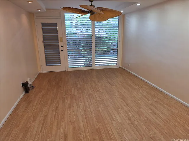 a view of a house with a flower plants