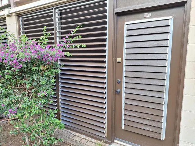 a view of a balcony with a pot