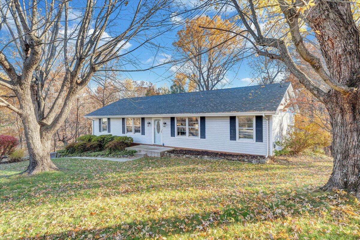 88 Persimmon Court Blue Ridge, VA 24064 - Photo 29 of 37 a front view of a house with a yard