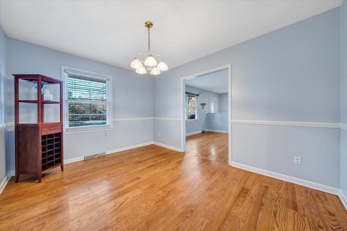 88 Persimmon Court Blue Ridge, VA 24064 - Photo 6 of 37 a view of livingroom with hardwood floor and kitchen view