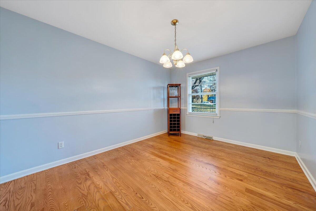 88 Persimmon Court Blue Ridge, VA 24064 - Photo 7 of 37 a view of an empty room with a window