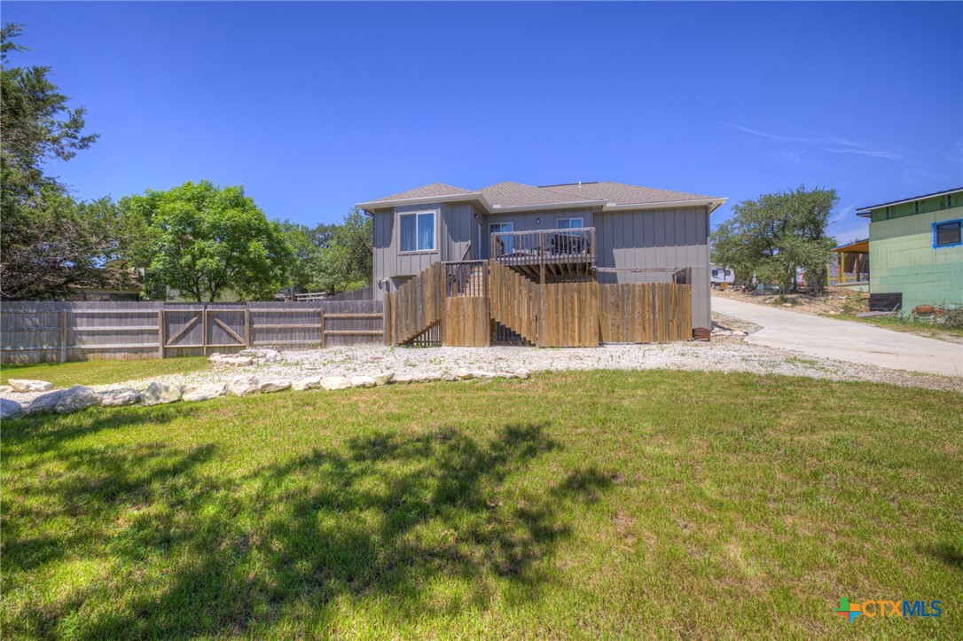 305 Lake Crest Spring Branch, TX 78070 - Photo 37 of 38 a house view with swimming pool in front of it