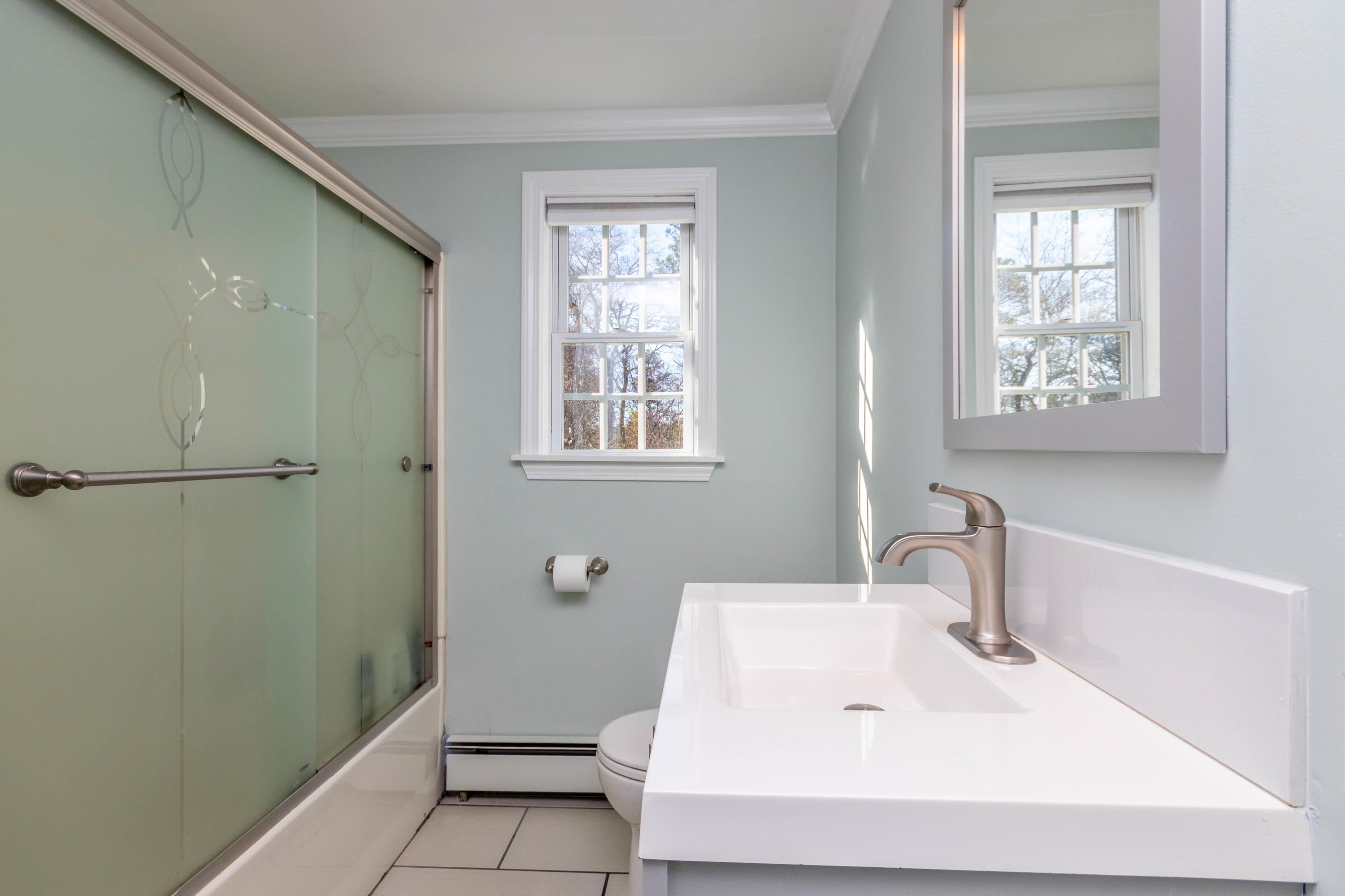 371 Megan Road Hyannis, MA 02601 - Photo 17 of 34 a bathroom with a sink a toilet and shower