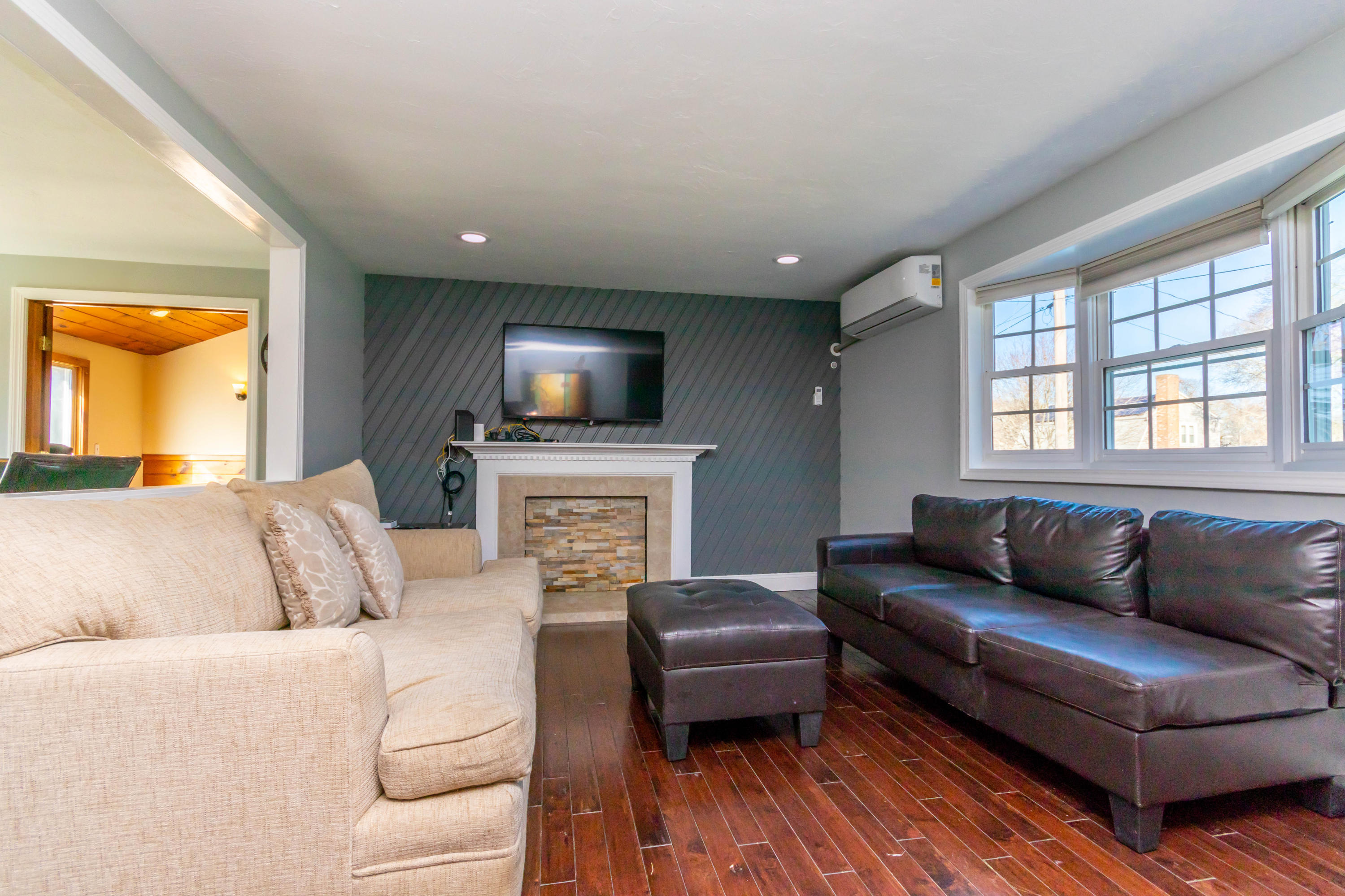 371 Megan Road Hyannis, MA 02601 - Photo 3 of 34 a living room with a couch and a flat screen tv