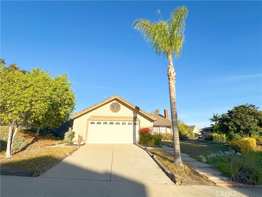 a view of a street with a sign board