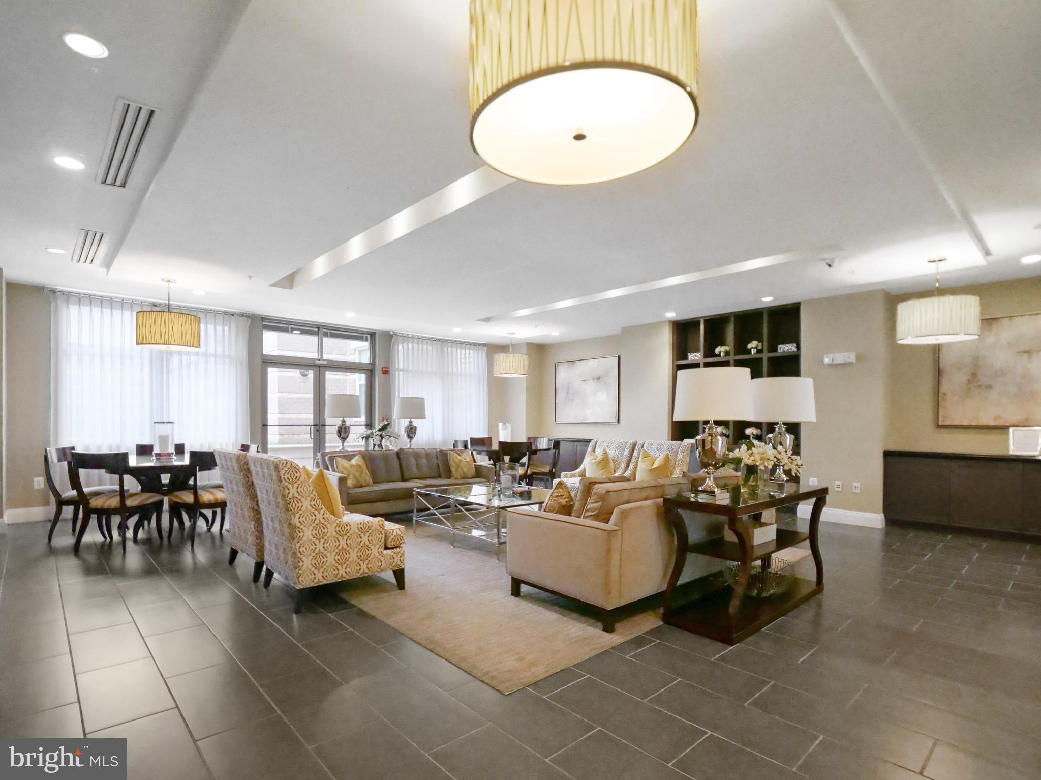 12000 Market Street, Unit 419 Reston, VA 20190 - Photo 22 of 31 Lounge with a bar available for private parties