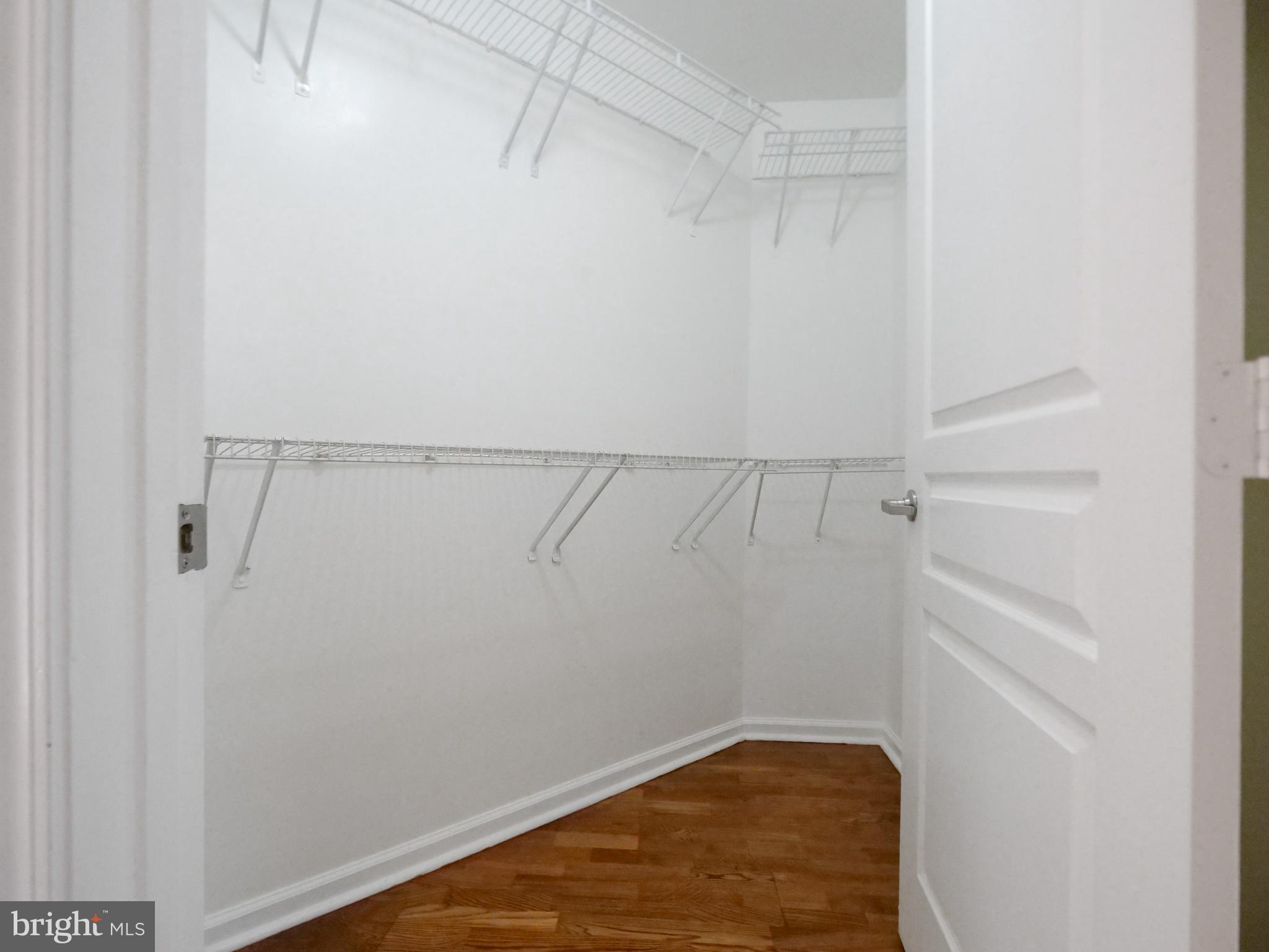 12000 Market Street, Unit 419 Reston, VA 20190 - Photo 9 of 31 Two closets including this walk-in