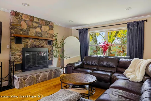 a view of a living room and dining room