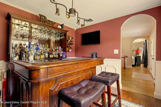 a kitchen with stainless steel appliances granite countertop a stove and cabinets