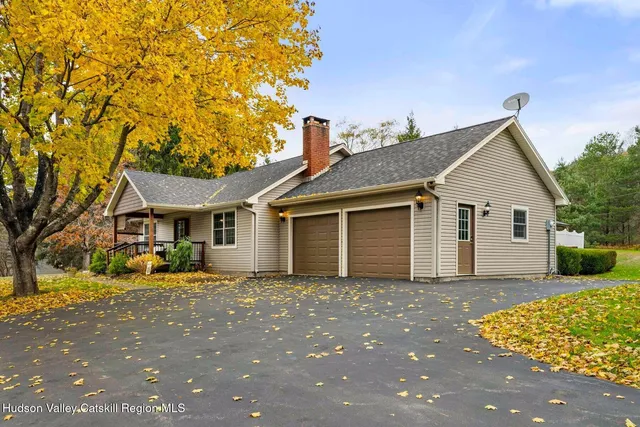 a view of a house with a patio