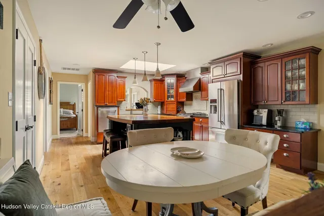 a living room with furniture and next to a window