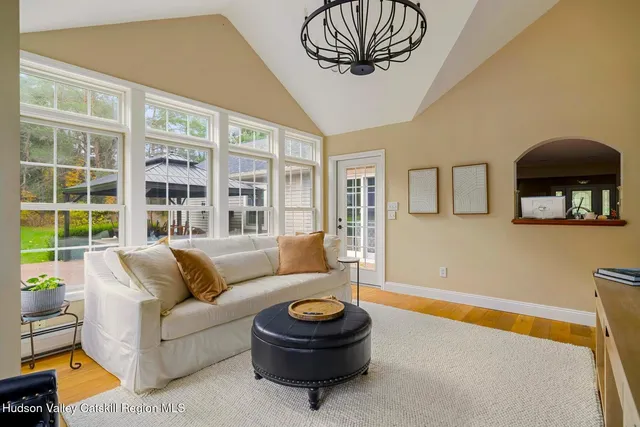 a bathroom with a toilet and a shower curtain