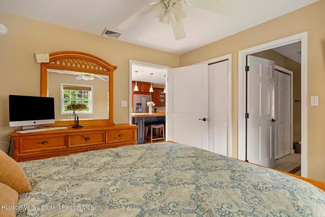 a view of a house with backyard and garden