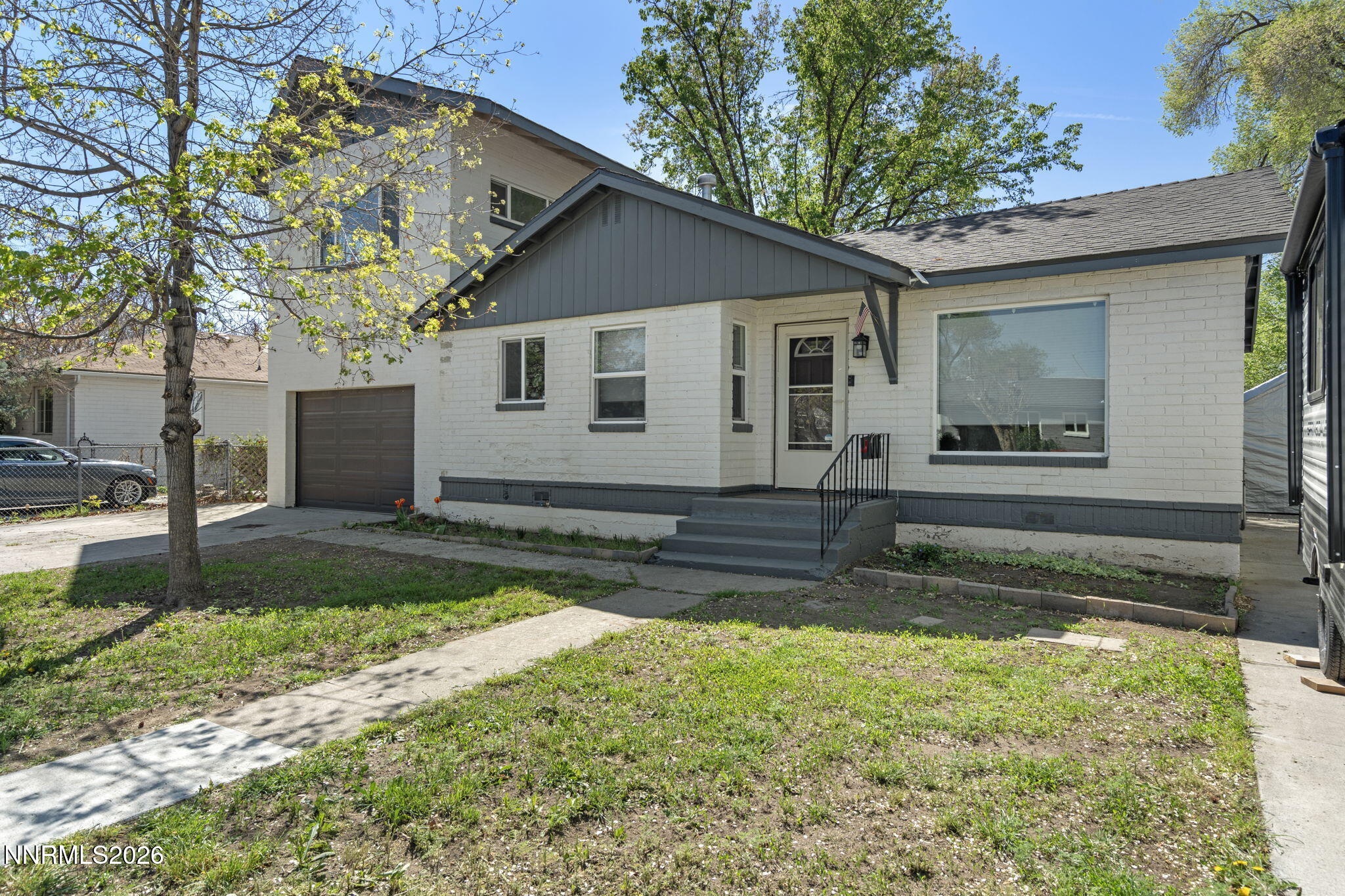 417 H Street Sparks, NV 89431 - Photo 1 of 46 a view of a house with a yard