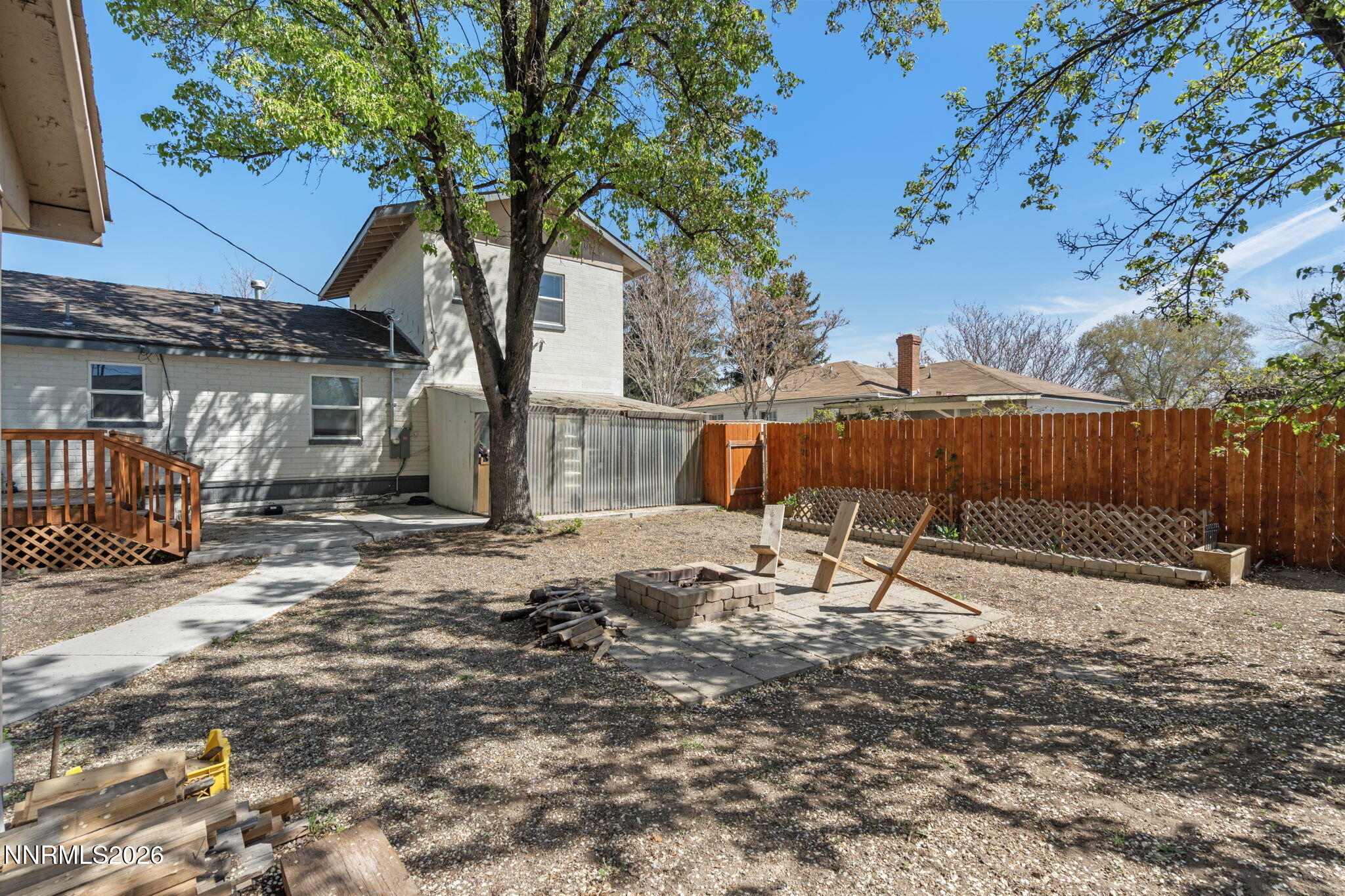 417 H Street Sparks, NV 89431 - Photo 34 of 46 a view of a backyard with a tree
