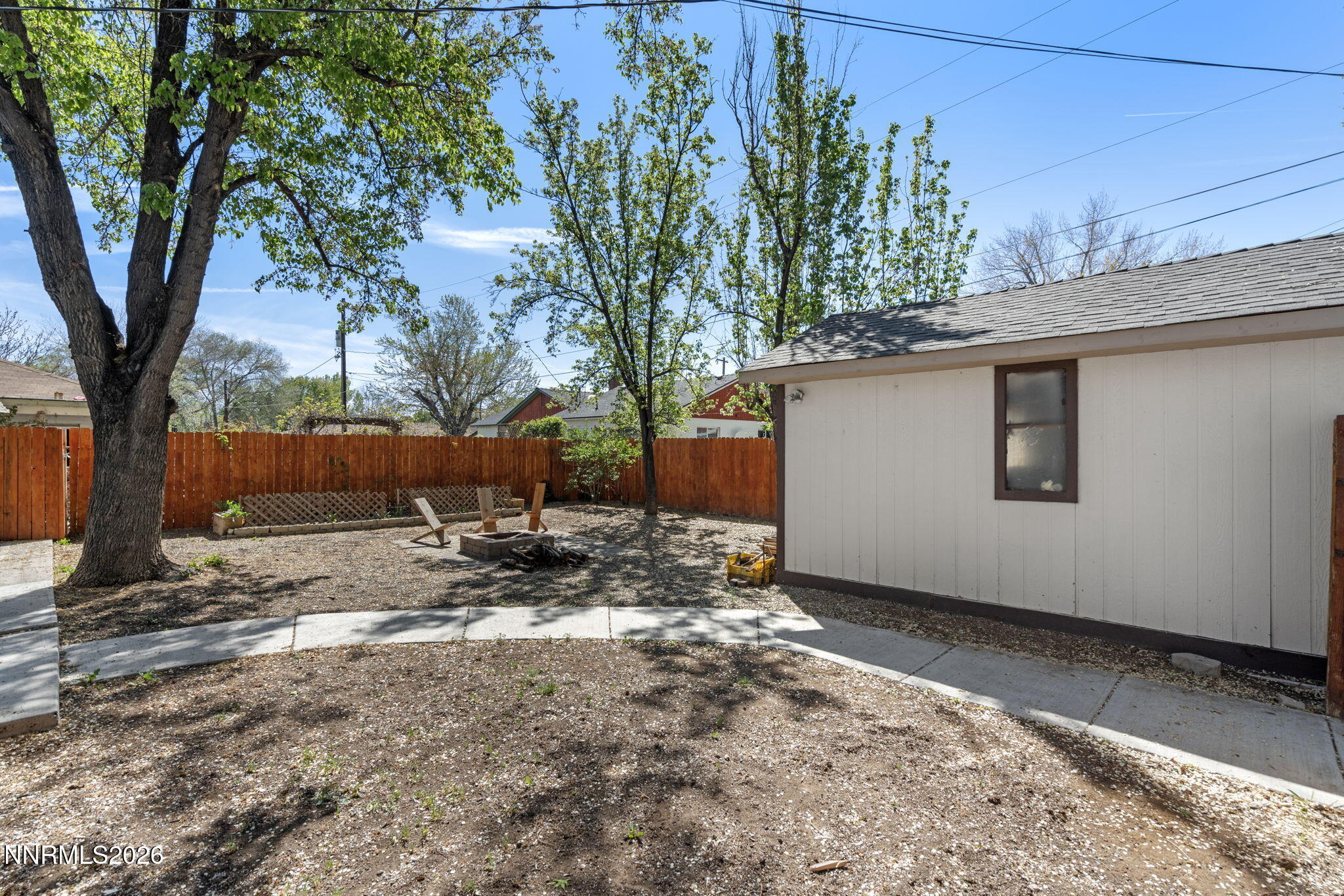 417 H Street Sparks, NV 89431 - Photo 39 of 46 a view of a backyard with a tree