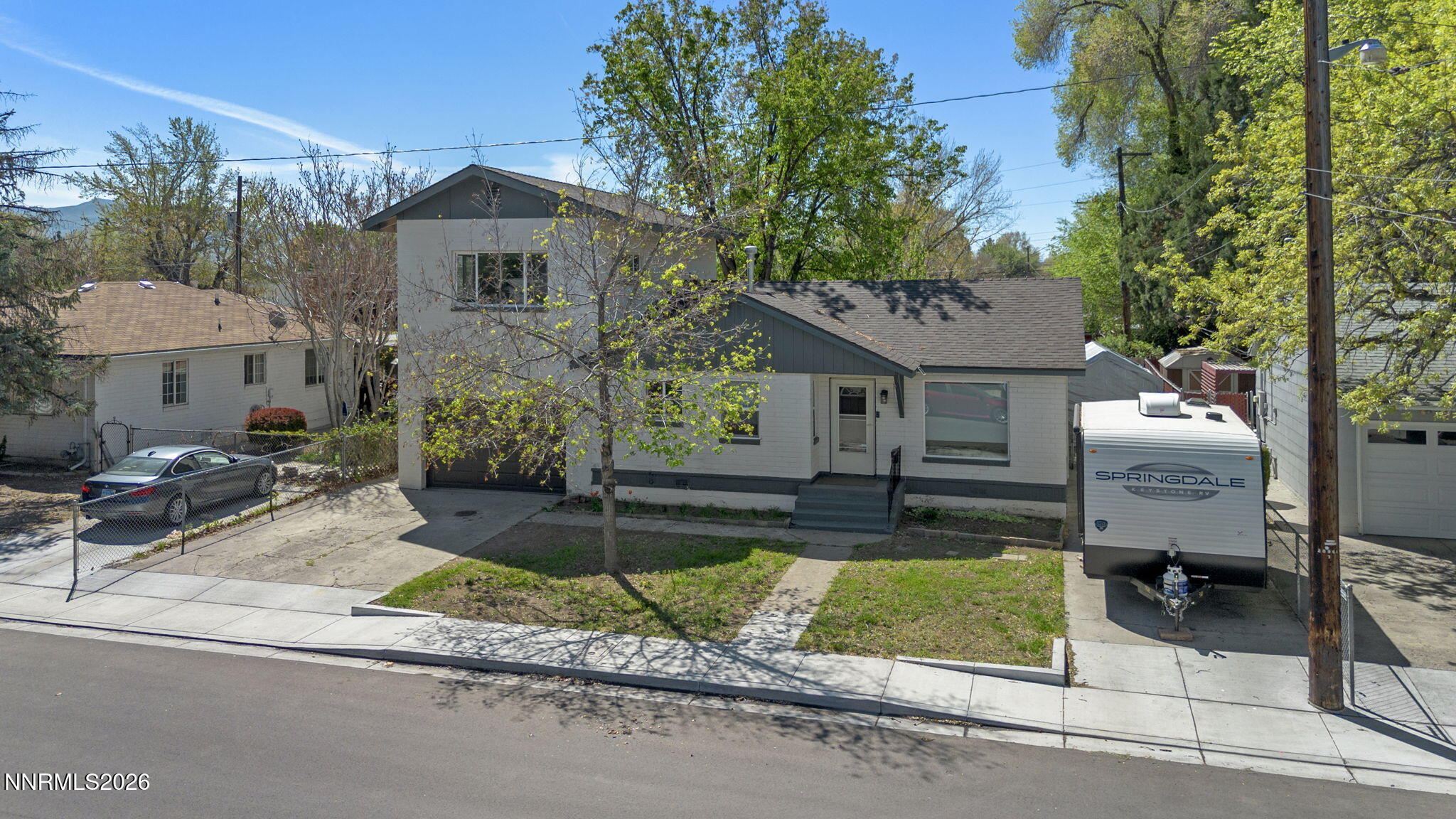 417 H Street Sparks, NV 89431 - Photo 5 of 46 a front view of a house with garden