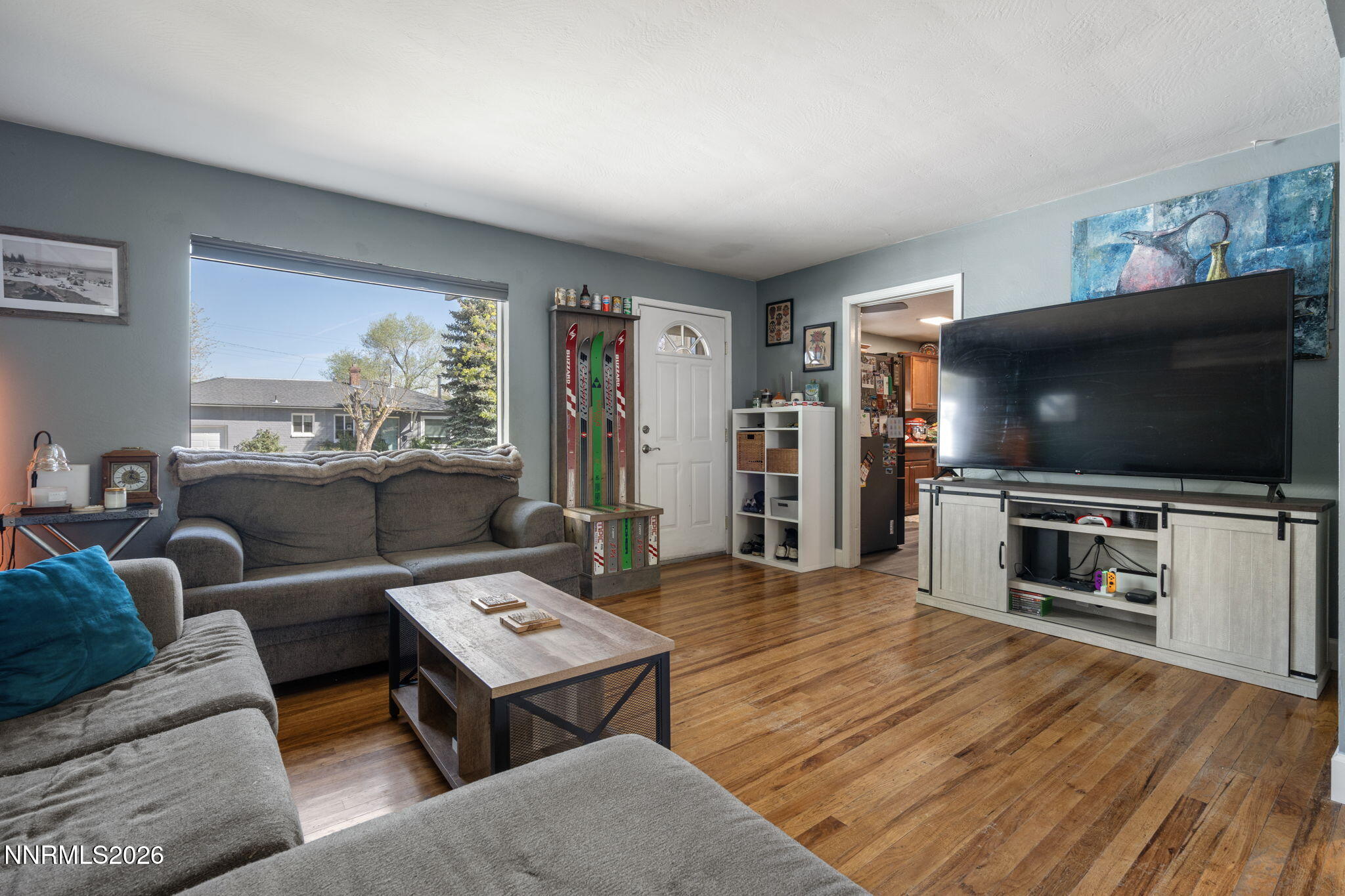 417 H Street Sparks, NV 89431 - Photo 9 of 46 a living room with furniture and a flat screen tv