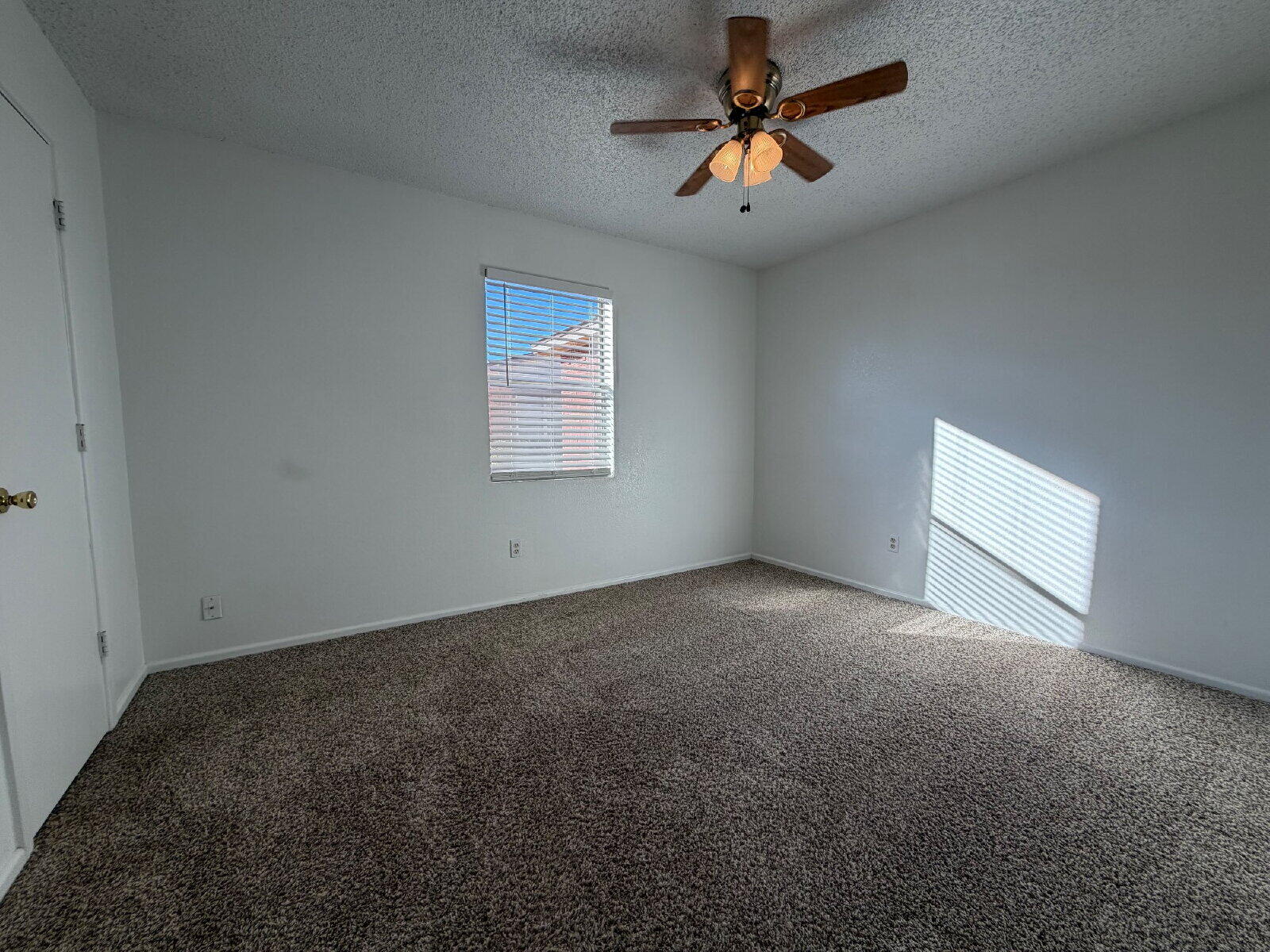 8210 Vernon Avenue, Unit A Lubbock, TX 79423 - Photo 4 of 8 a view of a big room with carpet