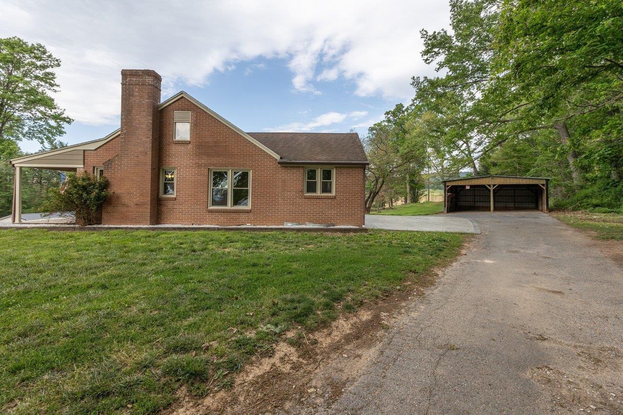 547 Grindstone Road Bridgewater, VA 22812 - Photo 43 of 57 a front view of house with yard and green space