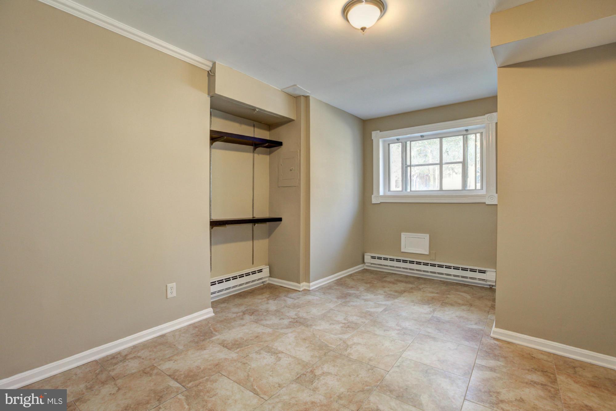 1739 19th Street Northwest Washington, DC 20009 - Photo 16 of 20 an empty room with windows