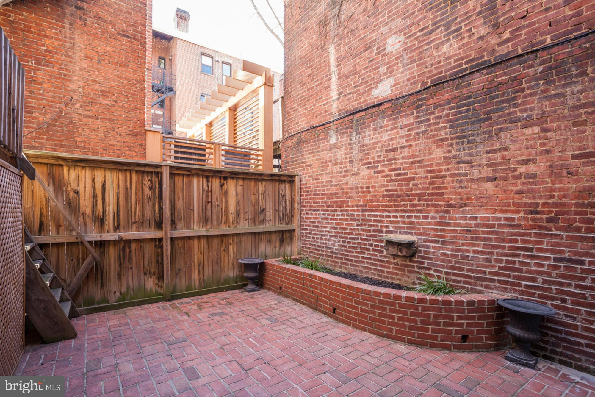 1739 19th Street Northwest Washington, DC 20009 - Photo 17 of 20 a view of entryway with wooden stairs