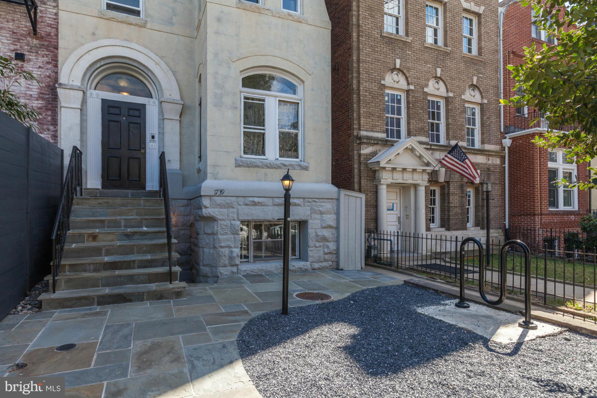 1739 19th Street Northwest Washington, DC 20009 - Photo 20 of 20 a view of a brick house with many windows