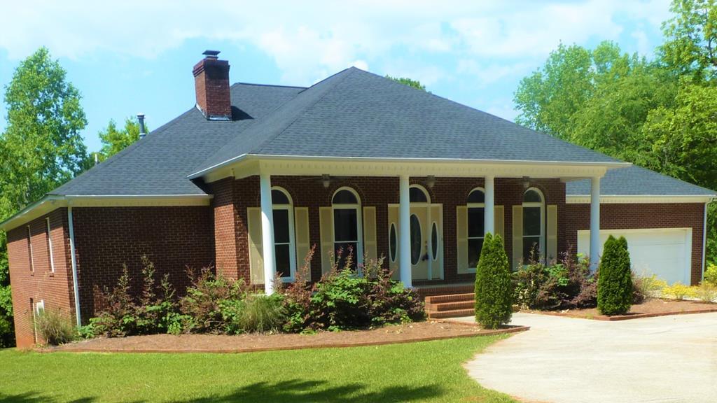 316 Lower Simmons Road Macon, GA 31220 - Photo 1 of 34 a house view with a garden space