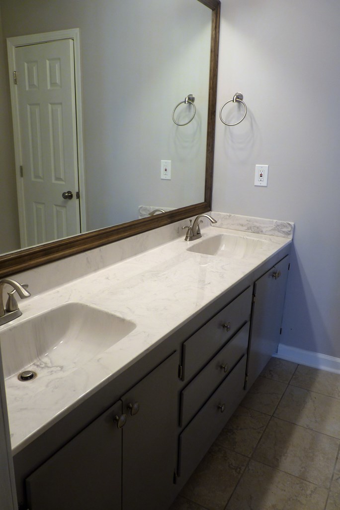 316 Lower Simmons Road Macon, GA 31220 - Photo 15 of 34 a bathroom with a sink and vanity