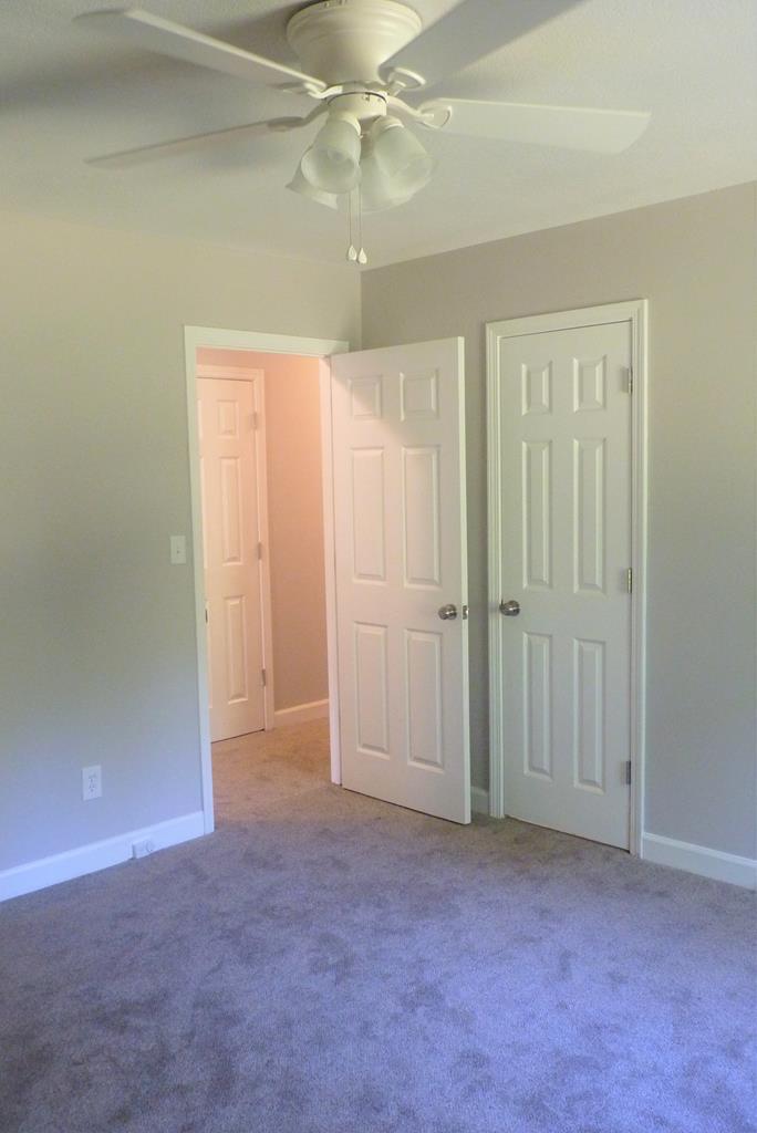 316 Lower Simmons Road Macon, GA 31220 - Photo 18 of 34 an empty room with closet area