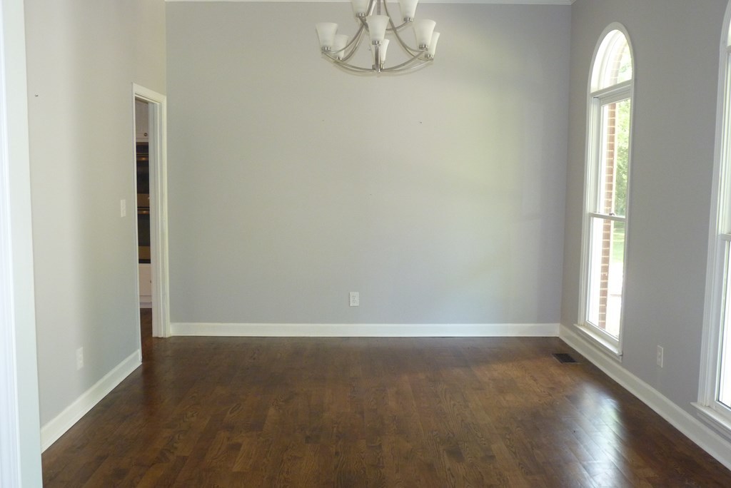 316 Lower Simmons Road Macon, GA 31220 - Photo 3 of 34 an empty room with windows