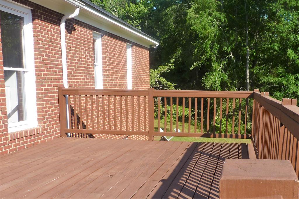 316 Lower Simmons Road Macon, GA 31220 - Photo 28 of 34 a view of a wooden deck