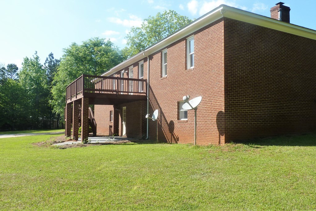 316 Lower Simmons Road Macon, GA 31220 - Photo 29 of 34 a view of a house with a park